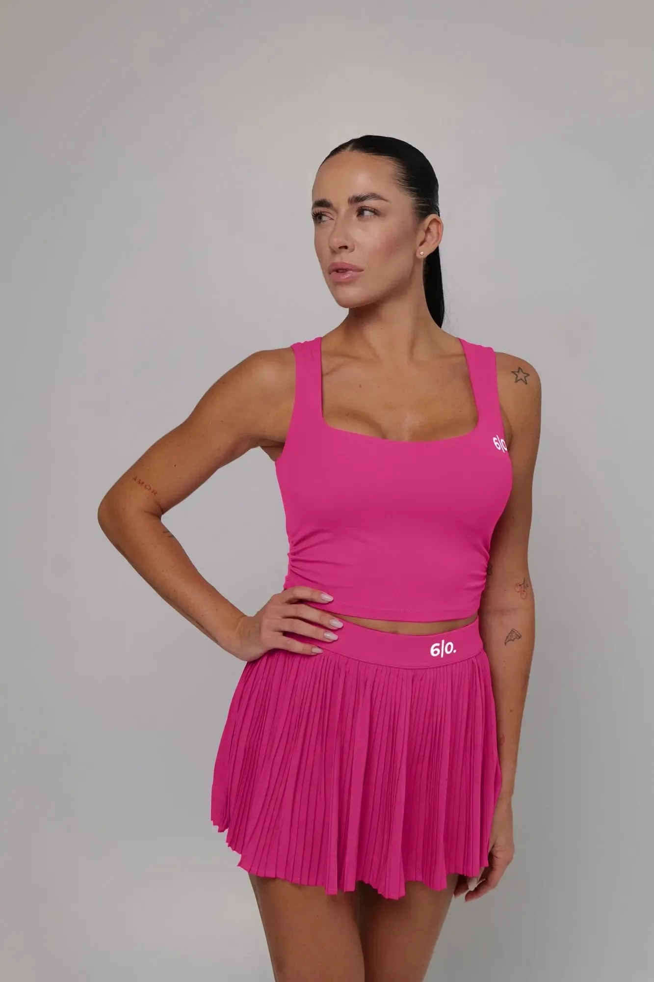 Pink color top and pleated skirt set